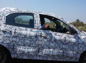 Tata-Kite-Hatchback-Spied-In-Pune-Side-600x445.jpg.pagespeed.ce.MMWf4NuY647YT0-FxZYS
