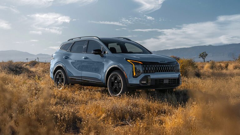Blue 2026 Kia Sportage photographed outdoors