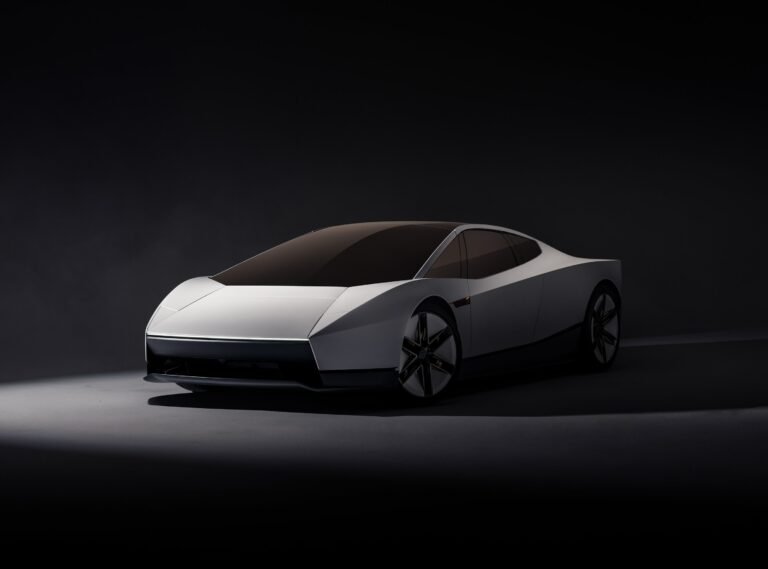A real photograph of the newly unveiled Roadster, ideally mid-air or during the upside-down demonstration.