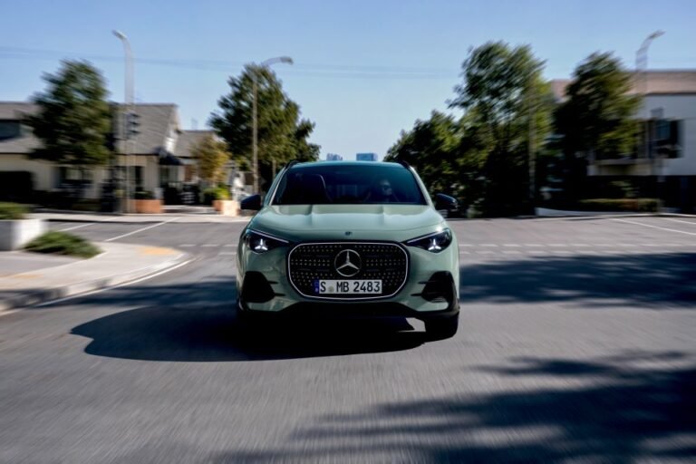 Green new-generation Mercedes-Benz GLA photographed from the front