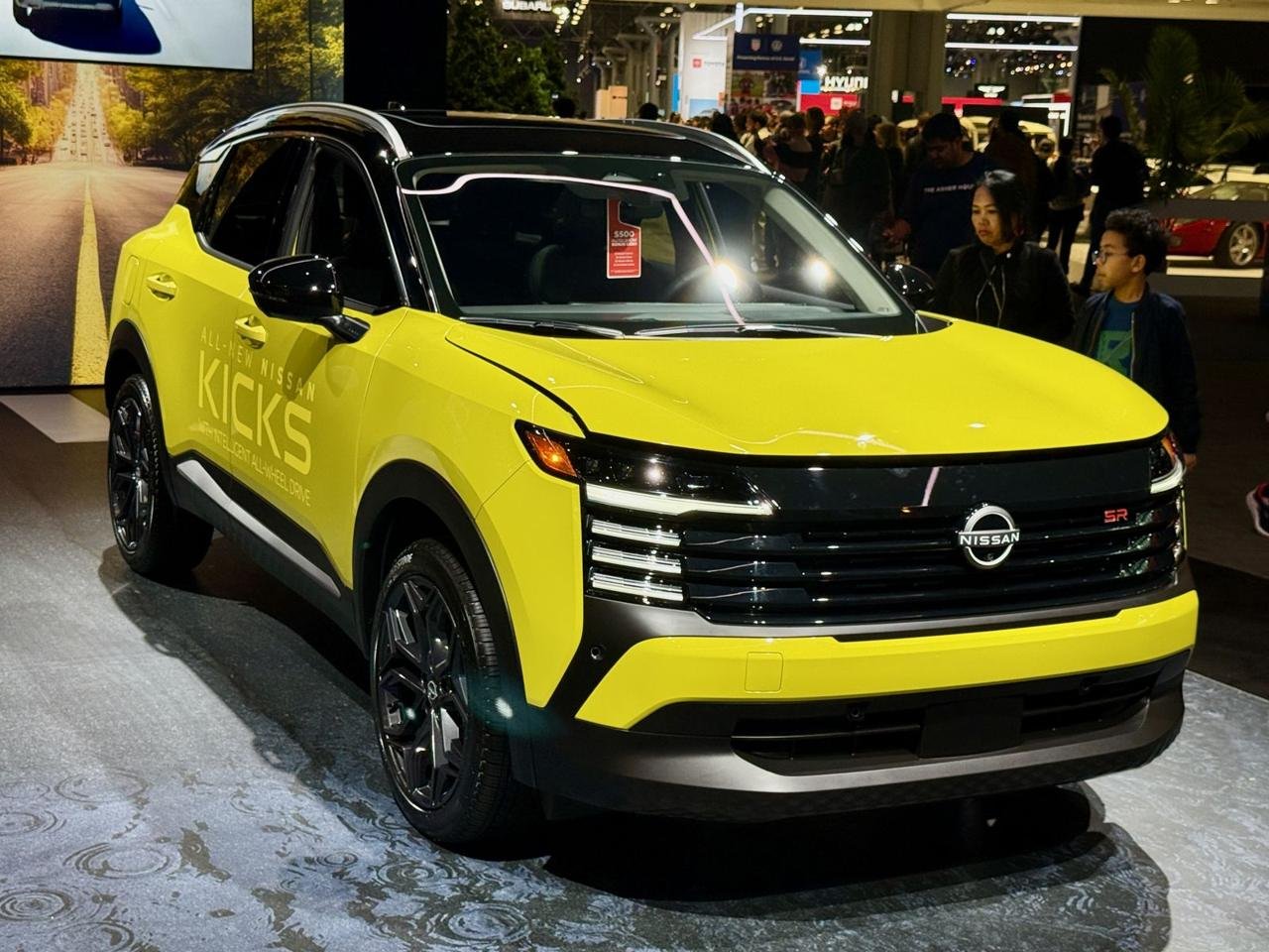 Yellow 2026 Nissan Kicks on display, photographed in April 2025