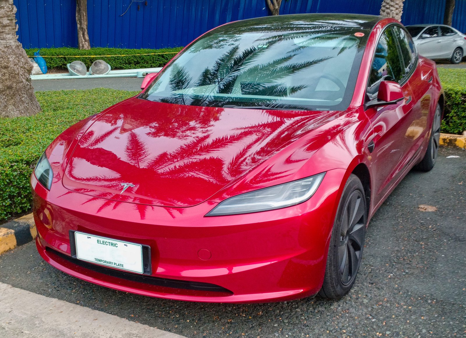 Red 2024 Tesla Model 3 Long Range RWD photographed in the Philippines in July 2024